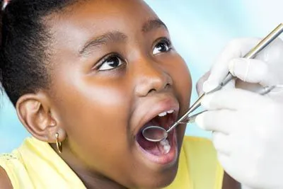 young girl getting dental care at Midtown Dental in Lakeland, FL